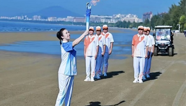 Ethnic minority games torch shines in Sanya