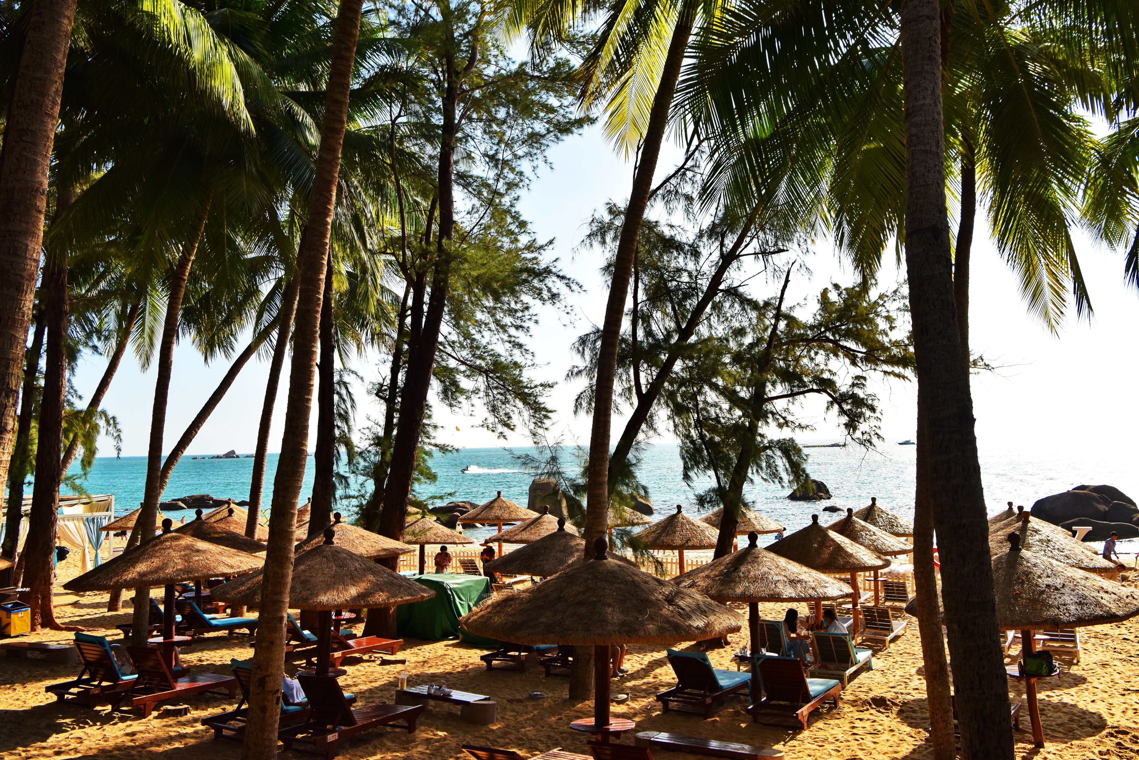 Tourists chill out on the beach at the Tianya Haijiao Scenic Area, also known as The End of the Earth. [ Photo provided to english.sanya.gov.cn]